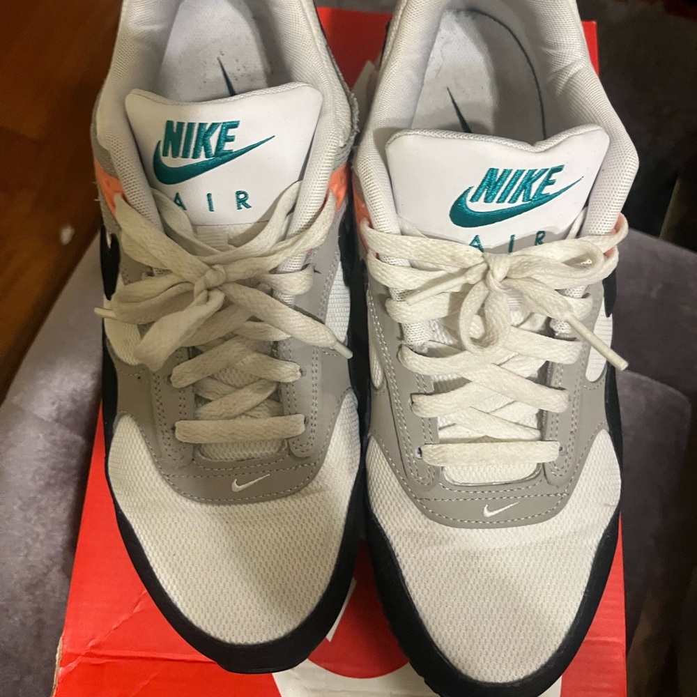 Nike Air Max Correlate sneakers in a white, black, orange & green colorway